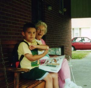 My grandmother sitting on a porch swing with my son.